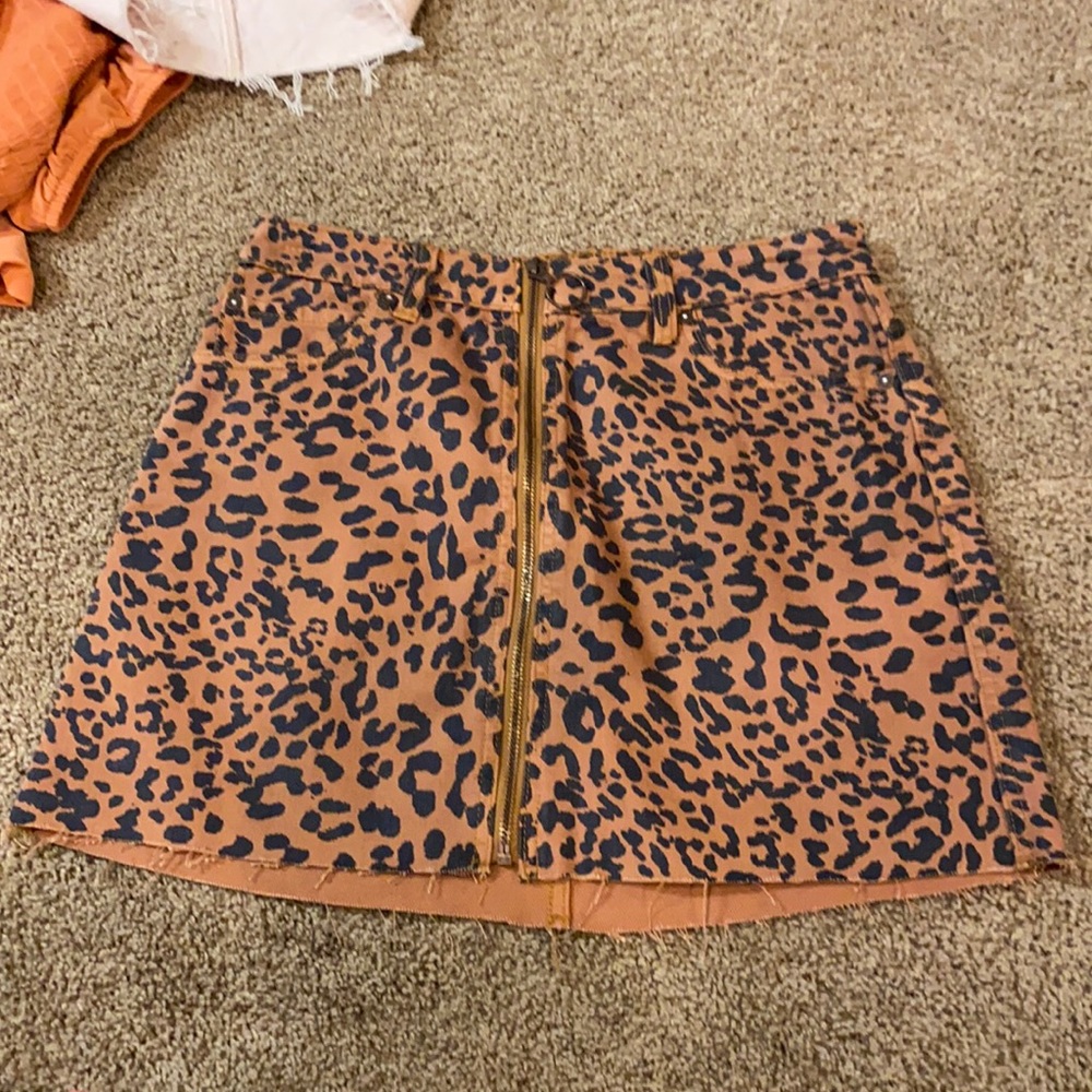 Free people jean skirt. Cheetah print size 27